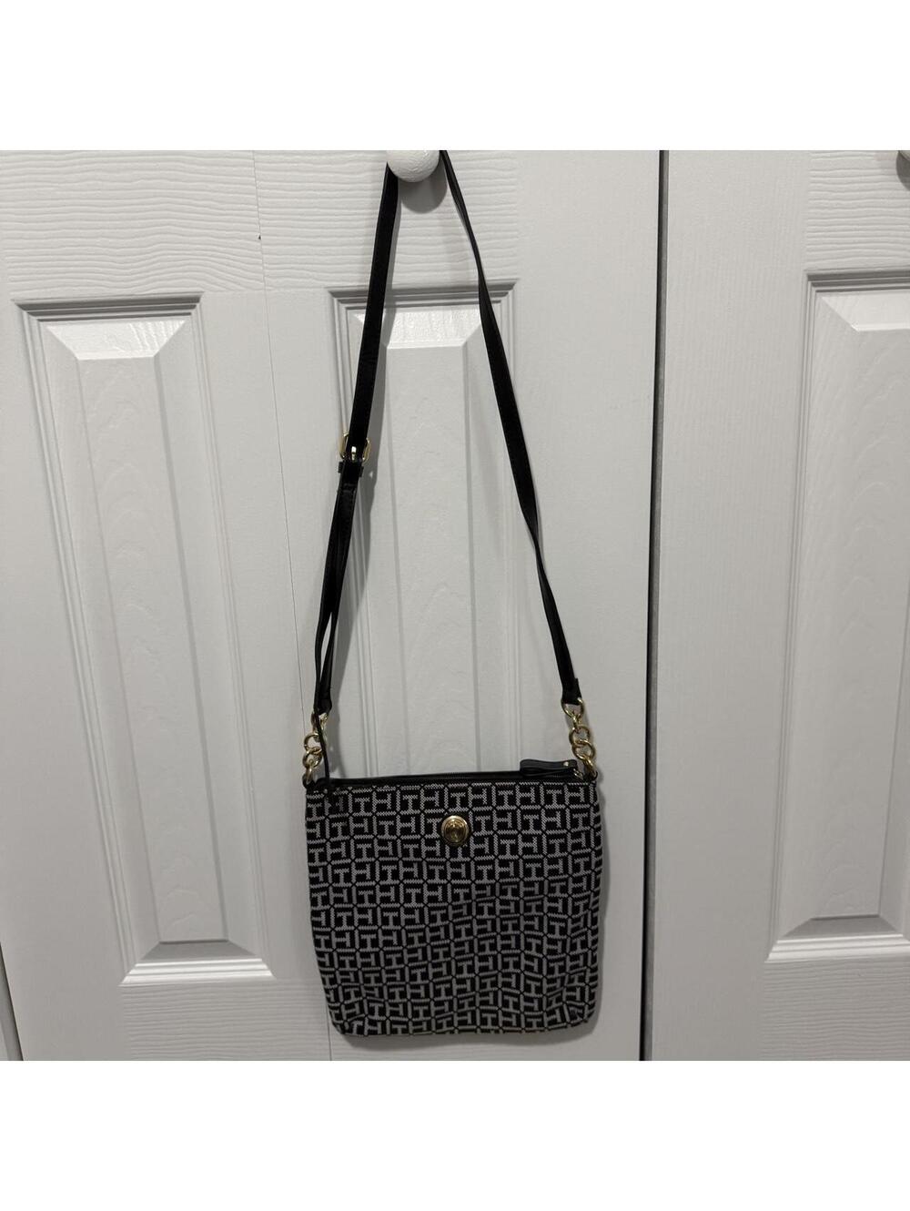 Black and white Tommy Hilfiger monogram crossbody bag with gold-tone hardware